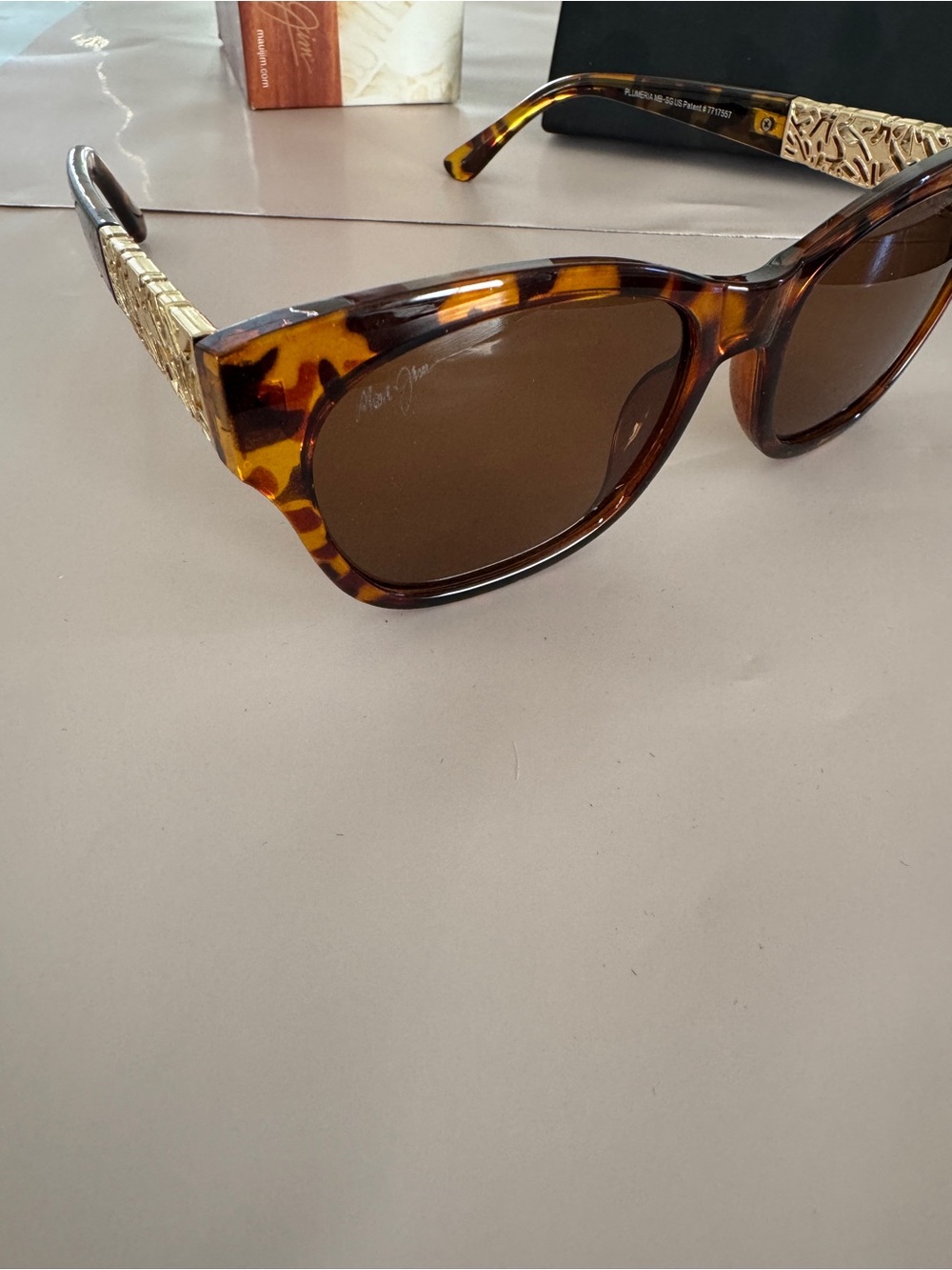 Maui Jim Tortoise Shell Sunglasses with Gold Temples and Brown Lenses